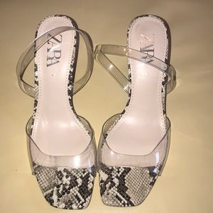 Snakeskin clear heels